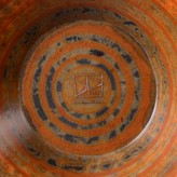 An incised DR mark on an orange earthenware bowl made by David Roberts sold at auction by Maak Contemporary Ceramics