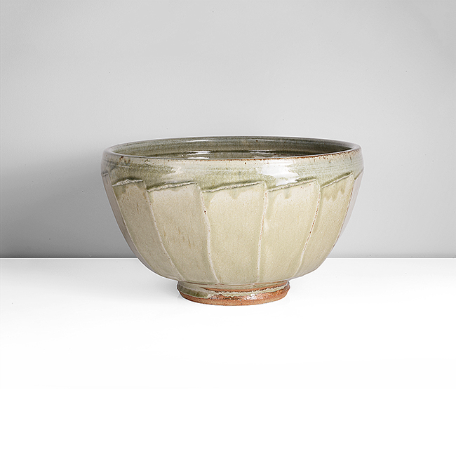 A green ash stoneware cut bowl made by Richard Batterham sold at auction by Maak Contemporary Ceramics